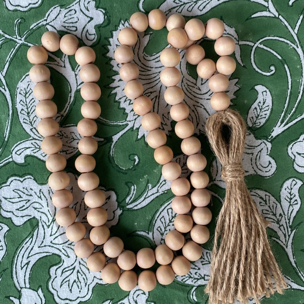 Natural wood bead necklace with jute tassel